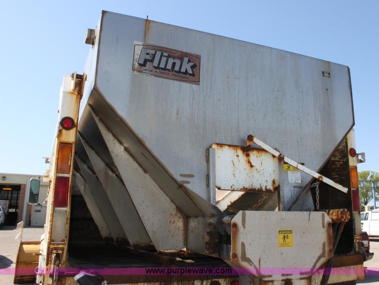 image for item A2893 1999 International 4900 tandem axle dump truck with plow and spreader