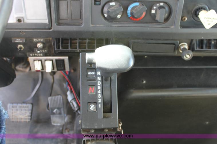 image for item A2894 2000 International F4900 tandem axle dump truck