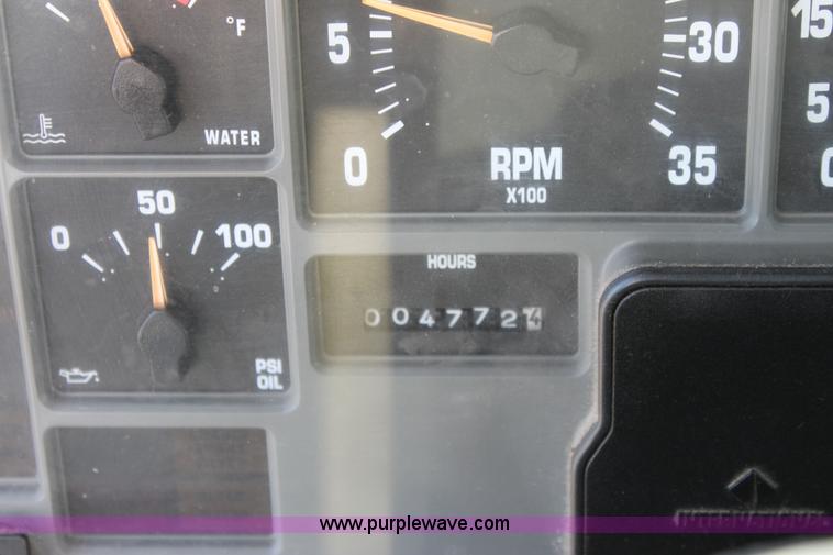 image for item A2894 2000 International F4900 tandem axle dump truck