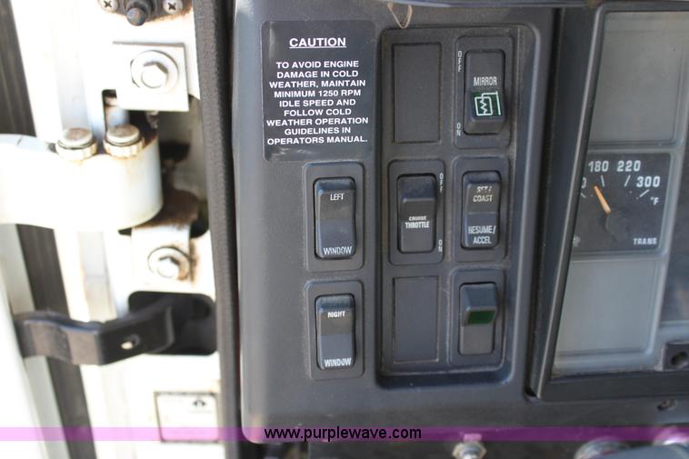 image for item A2894 2000 International F4900 tandem axle dump truck