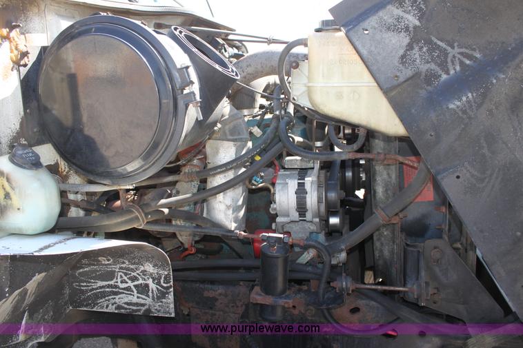 image for item A2894 2000 International F4900 tandem axle dump truck