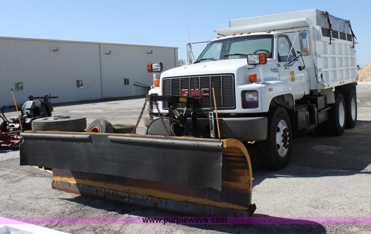 image for item A2914 1996 GMC TopKick tandem axle dump truck with plow and spreader