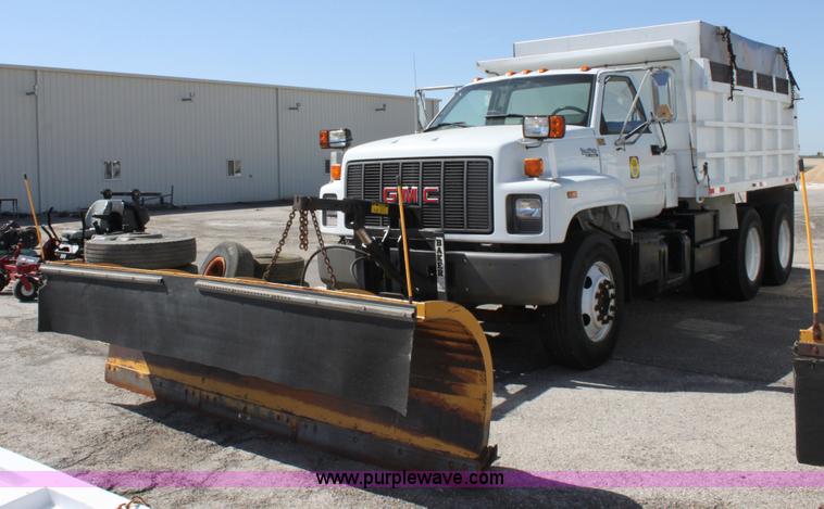 image for item A2914 1996 GMC TopKick tandem axle dump truck with plow and spreader