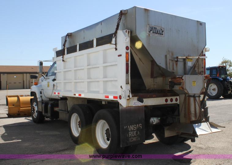 image for item A2914 1996 GMC TopKick tandem axle dump truck with plow and spreader