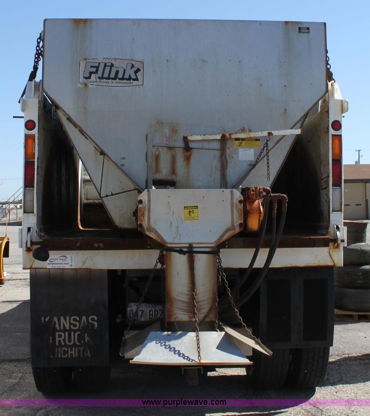 image for item A2914 1996 GMC TopKick tandem axle dump truck with plow and spreader