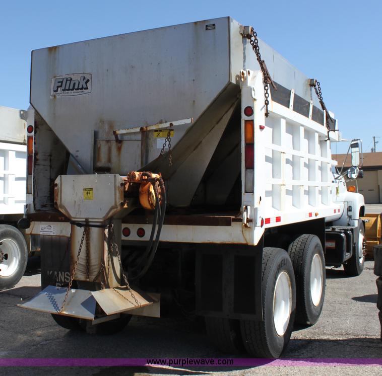 image for item A2914 1996 GMC TopKick tandem axle dump truck with plow and spreader