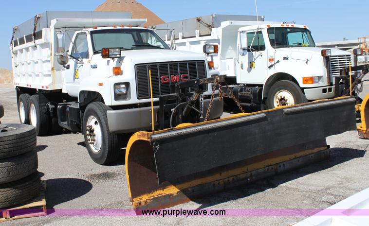 image for item A2914 1996 GMC TopKick tandem axle dump truck with plow and spreader
