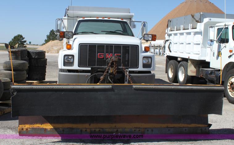 image for item A2914 1996 GMC TopKick tandem axle dump truck with plow and spreader