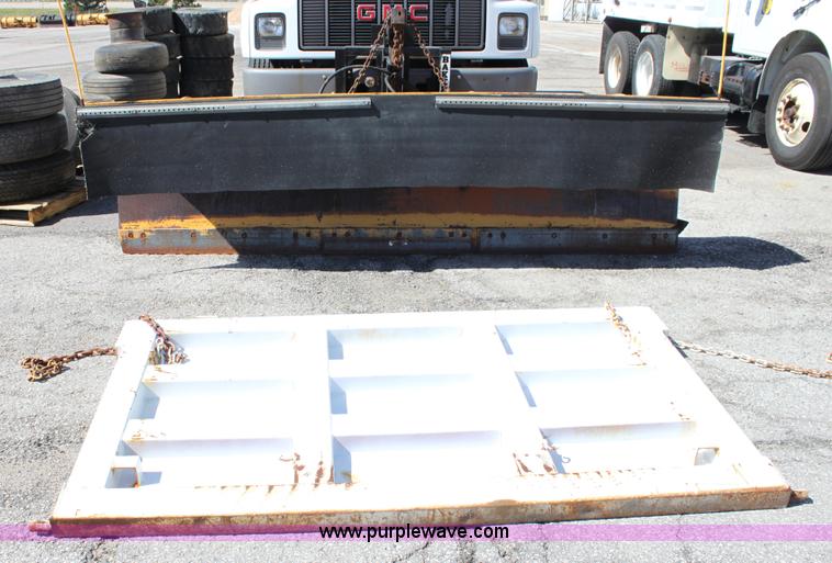 image for item A2914 1996 GMC TopKick tandem axle dump truck with plow and spreader