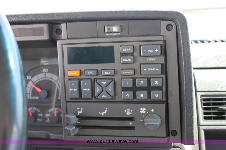 image for item A2914 1996 GMC TopKick tandem axle dump truck with plow and spreader