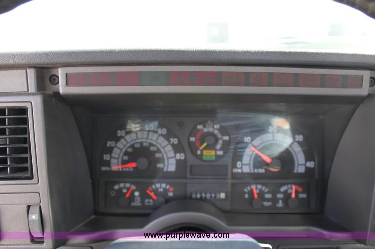 image for item A2914 1996 GMC TopKick tandem axle dump truck with plow and spreader