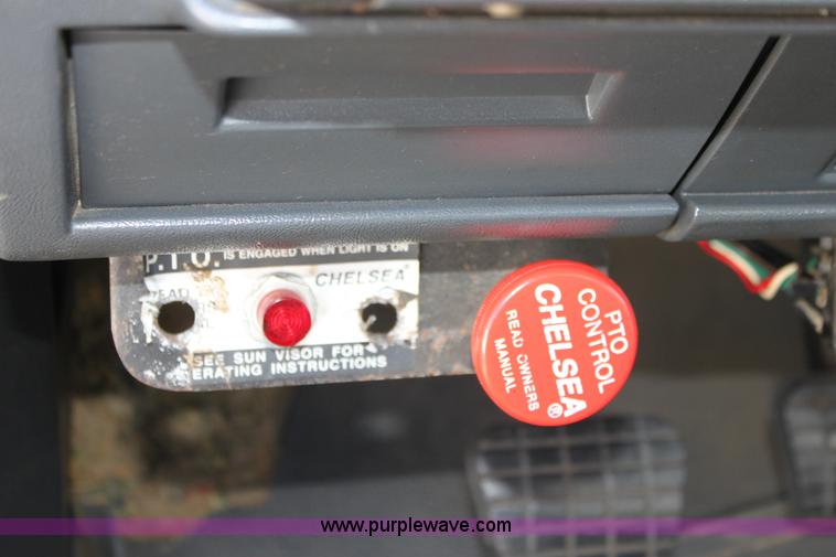 image for item A2914 1996 GMC TopKick tandem axle dump truck with plow and spreader