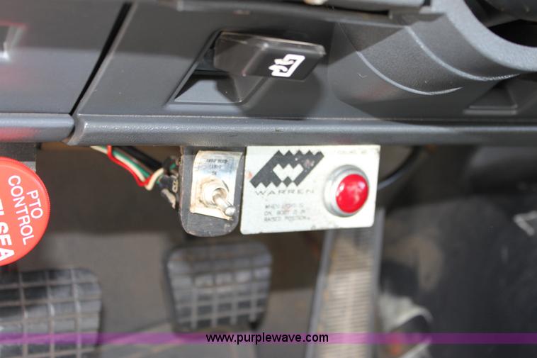 image for item A2914 1996 GMC TopKick tandem axle dump truck with plow and spreader