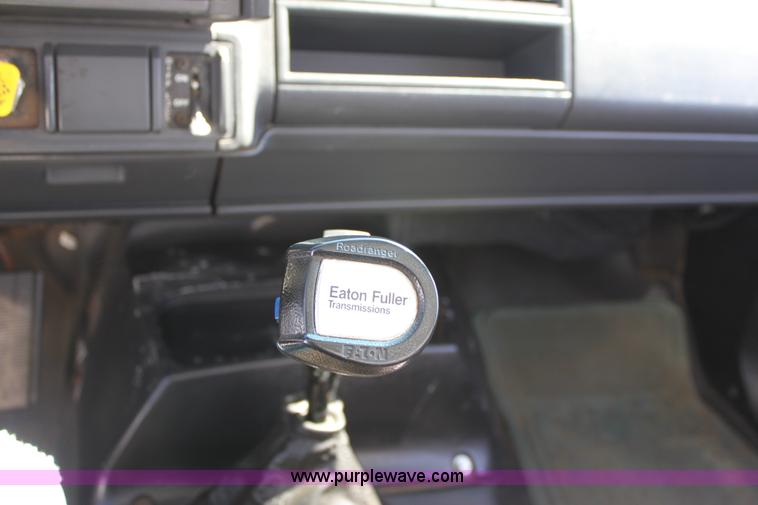 image for item A2914 1996 GMC TopKick tandem axle dump truck with plow and spreader