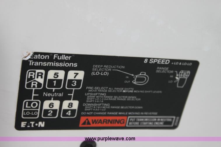 image for item A2914 1996 GMC TopKick tandem axle dump truck with plow and spreader