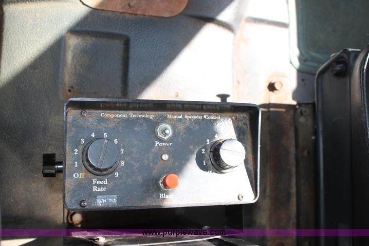 image for item A2914 1996 GMC TopKick tandem axle dump truck with plow and spreader