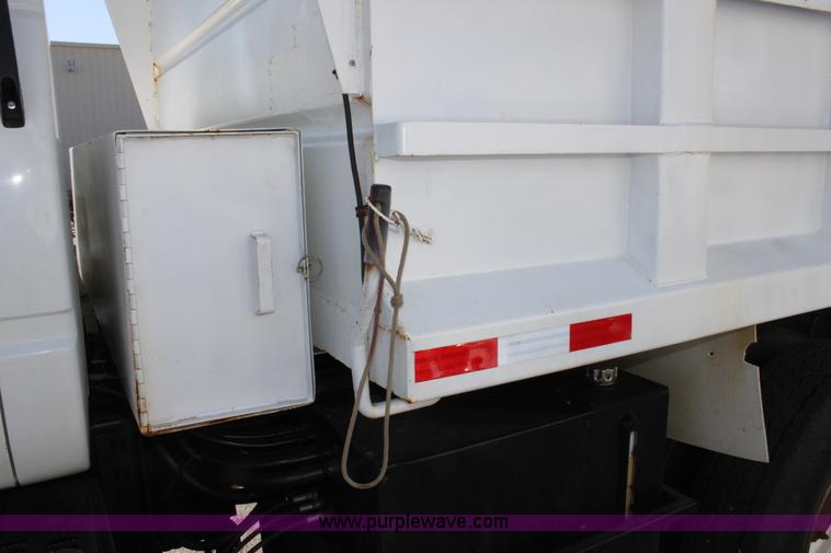 image for item A2914 1996 GMC TopKick tandem axle dump truck with plow and spreader