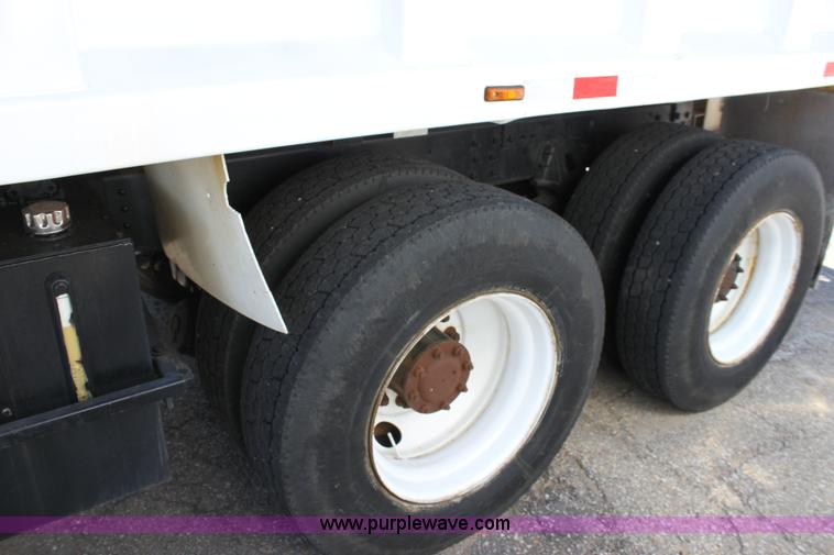 image for item A2914 1996 GMC TopKick tandem axle dump truck with plow and spreader