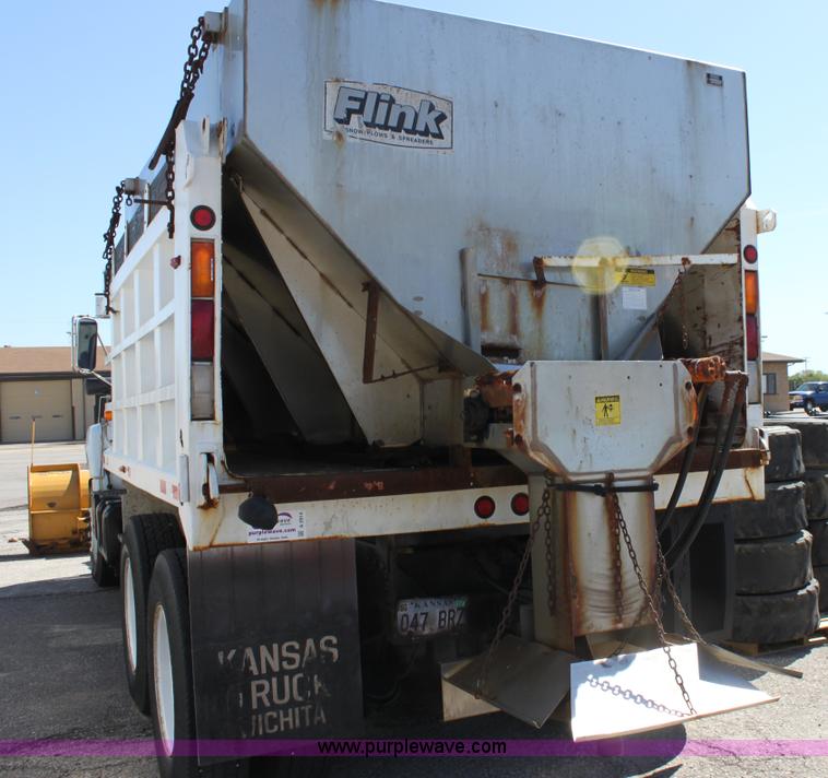 image for item A2914 1996 GMC TopKick tandem axle dump truck with plow and spreader