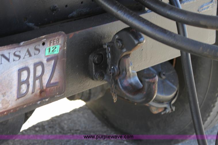 image for item A2914 1996 GMC TopKick tandem axle dump truck with plow and spreader