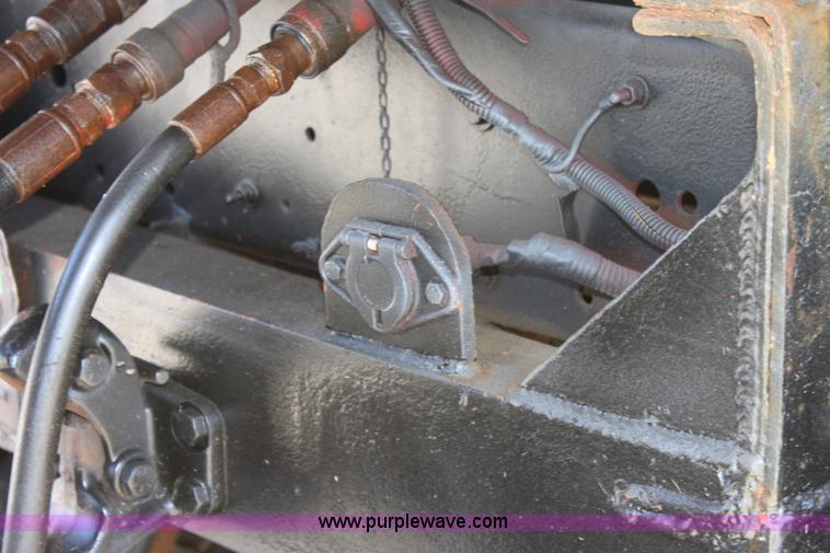 image for item A2914 1996 GMC TopKick tandem axle dump truck with plow and spreader