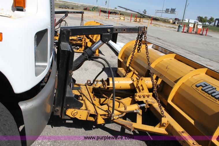 image for item A2914 1996 GMC TopKick tandem axle dump truck with plow and spreader