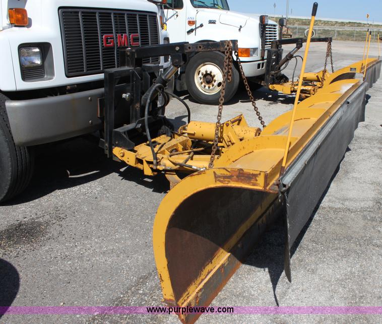 image for item A2914 1996 GMC TopKick tandem axle dump truck with plow and spreader