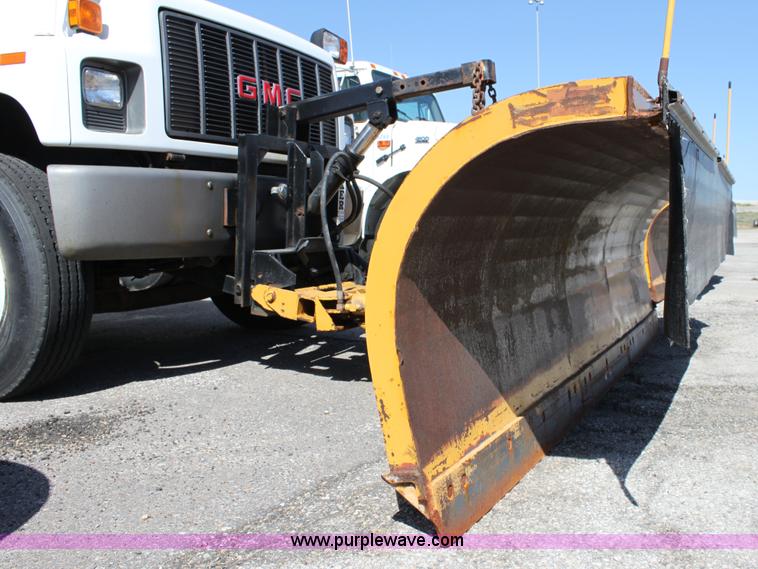 image for item A2914 1996 GMC TopKick tandem axle dump truck with plow and spreader