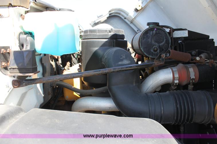 image for item A2914 1996 GMC TopKick tandem axle dump truck with plow and spreader