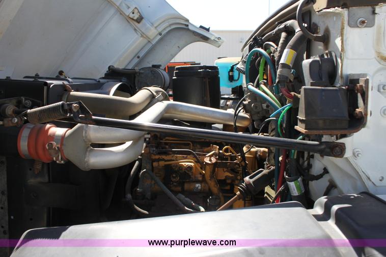 image for item A2914 1996 GMC TopKick tandem axle dump truck with plow and spreader