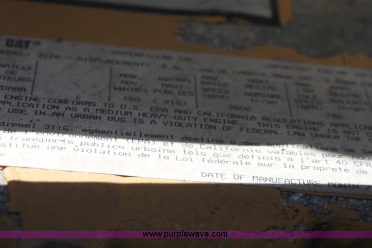 image for item A2914 1996 GMC TopKick tandem axle dump truck with plow and spreader