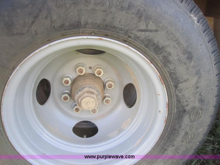 image for item C5029 1999 Texas Bragg 30' flatbed trailer