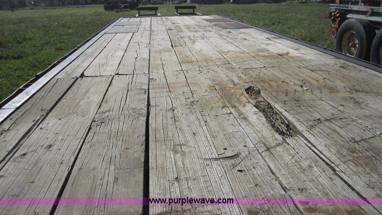 image for item C5029 1999 Texas Bragg 30' flatbed trailer