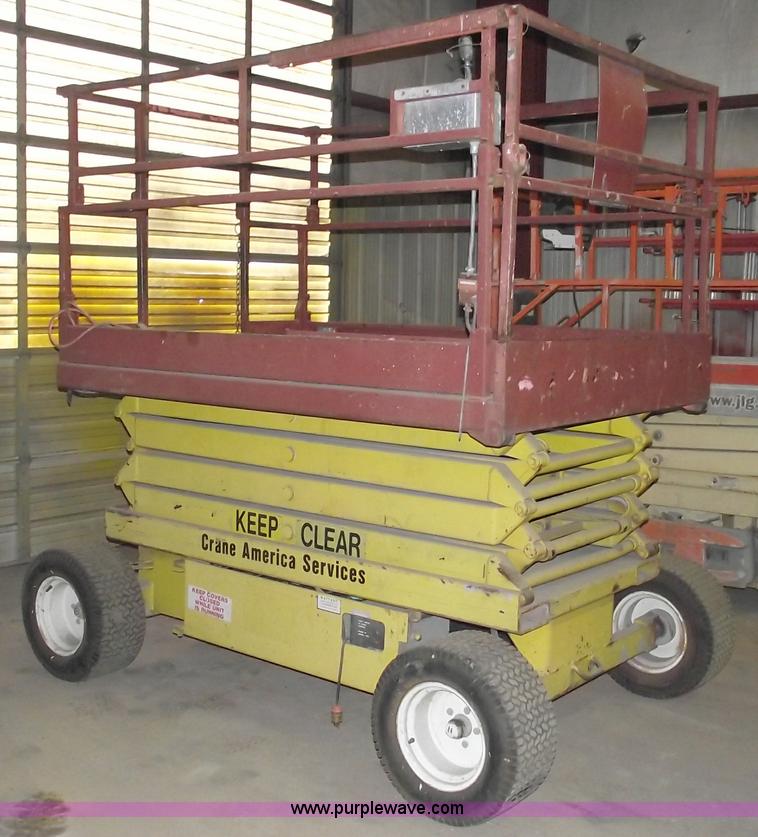 image for item C5574 1993 Skyjack 6826 electric scissor lift