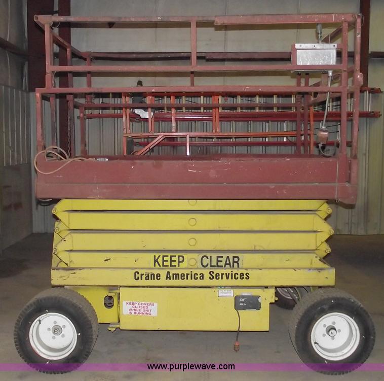 image for item C5574 1993 Skyjack 6826 electric scissor lift
