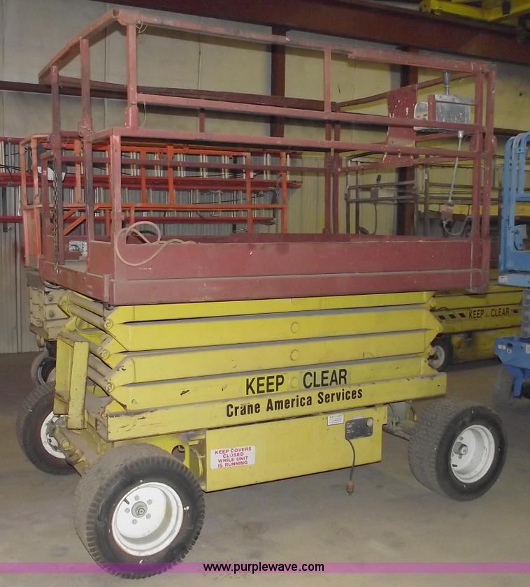 image for item C5574 1993 Skyjack 6826 electric scissor lift
