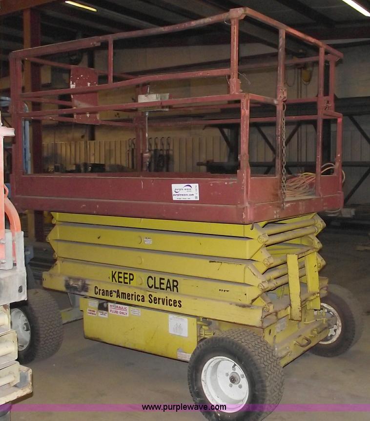 image for item C5574 1993 Skyjack 6826 electric scissor lift