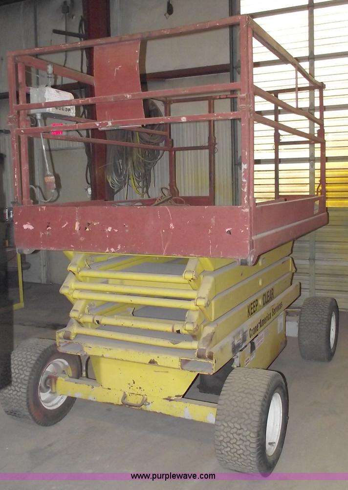 image for item C5574 1993 Skyjack 6826 electric scissor lift