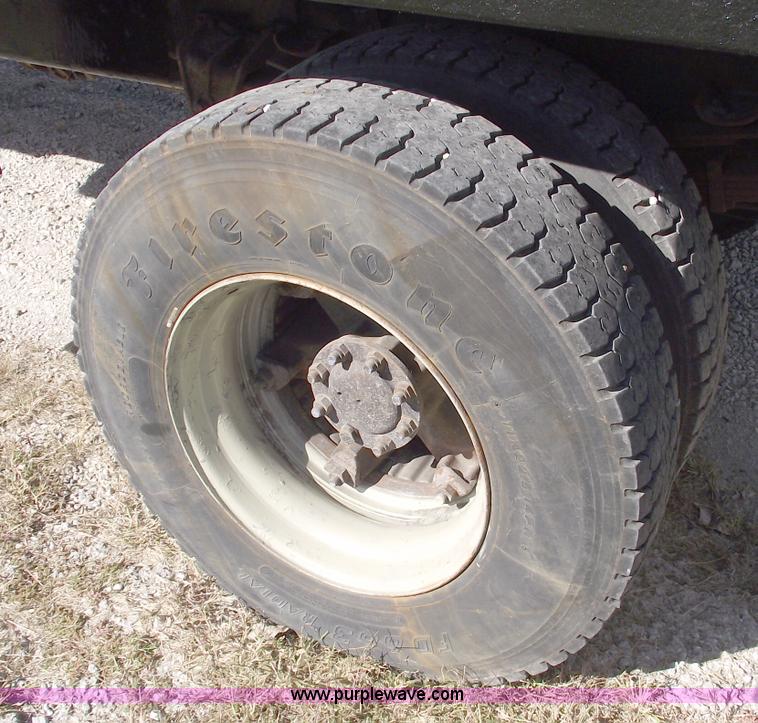 image for item C5619 1999 International 4700 dump truck