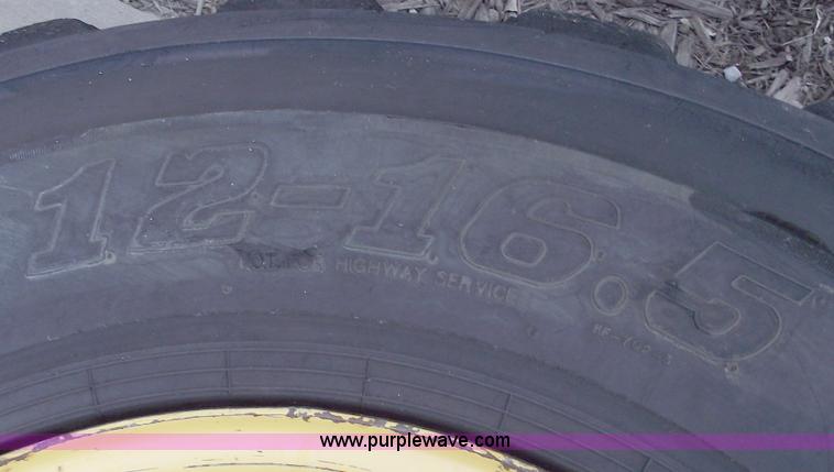 image for item C5628 (5) skid steer wheels and tires