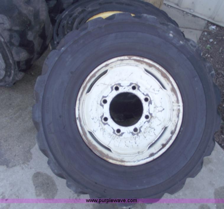 image for item C5628 (5) skid steer wheels and tires