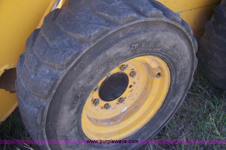 image for item D8530 1999 John Deere 250 skid steer