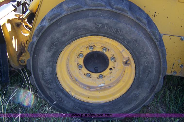 image for item D8530 1999 John Deere 250 skid steer