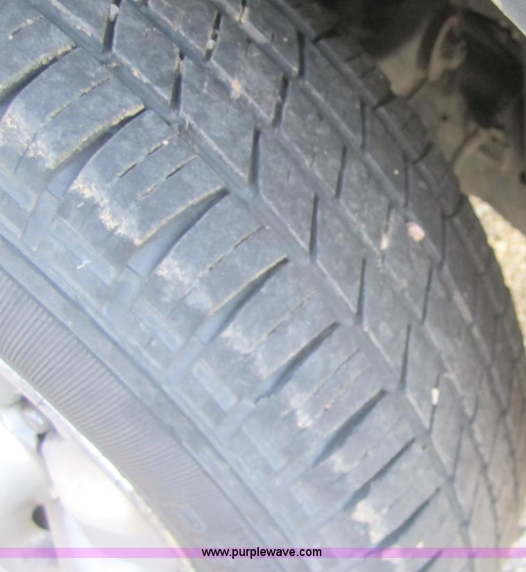 image for item B5527 1997 Nissan pickup truck