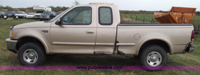 image for item C5673 1997 Ford F150 XLT super cab pickup truck