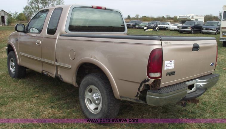 image for item C5673 1997 Ford F150 XLT super cab pickup truck