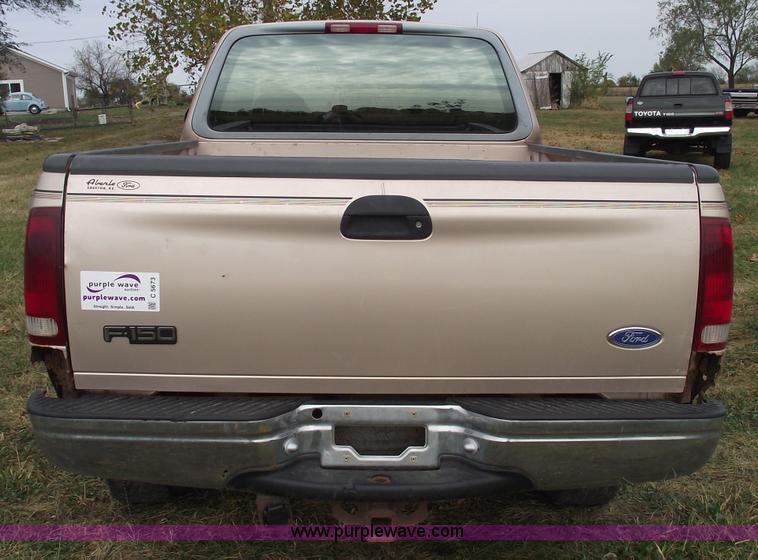 image for item C5673 1997 Ford F150 XLT super cab pickup truck