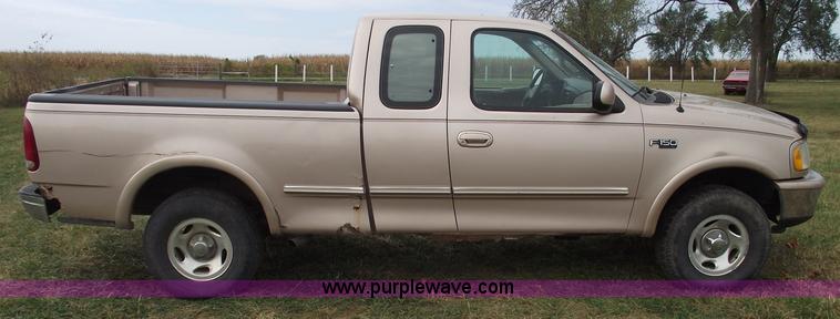 image for item C5673 1997 Ford F150 XLT super cab pickup truck