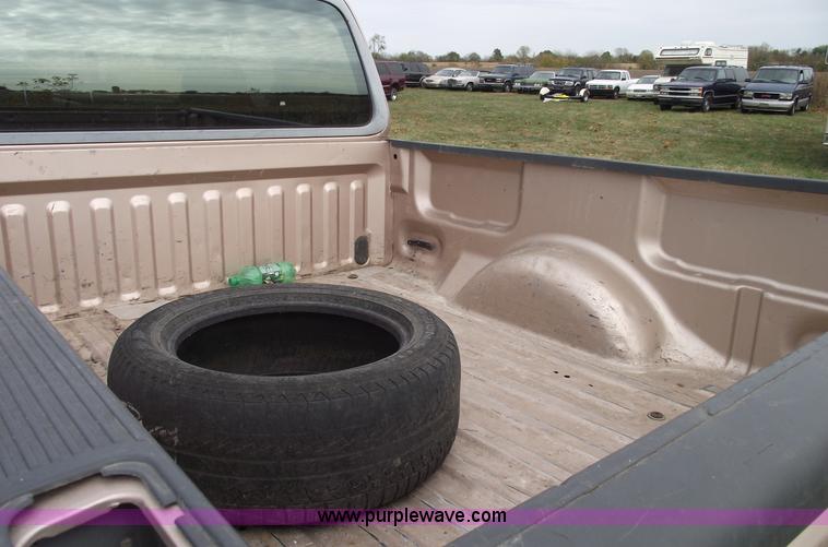 image for item C5673 1997 Ford F150 XLT super cab pickup truck