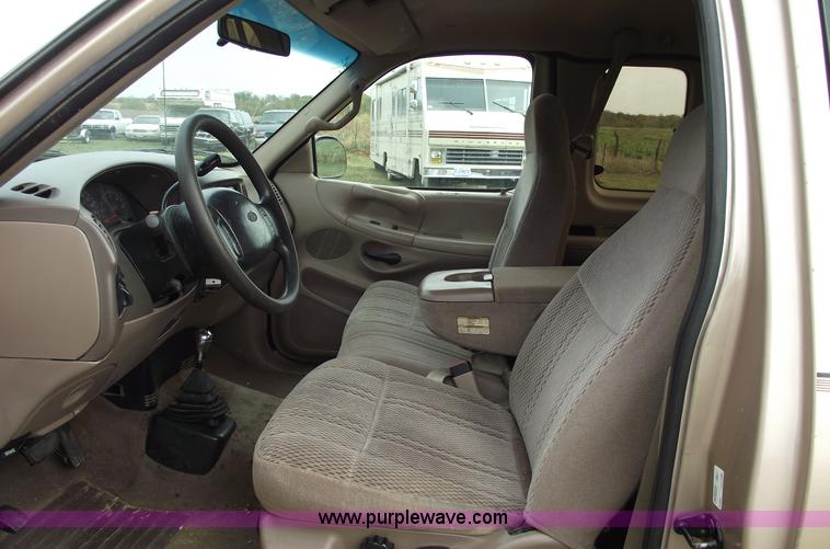 image for item C5673 1997 Ford F150 XLT super cab pickup truck